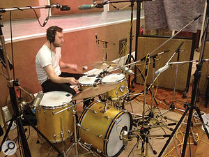 Session drummer Leo Taylor was recruited to recreate many of the sampled breakbeats and loops that had featured on John Newman's demos. Set up in Studio 1 at RAK, his kit is miked with Neumann U47 FETs on toms and kick, the latter joined by an AKG D12, while a Shure SM57 covers snare duties, and overheads are handled by two Coles 4038 ribbon mics flanking a central capacitor mic.