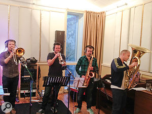 A four-piece brass section provided the icing on the cake for several songs.
