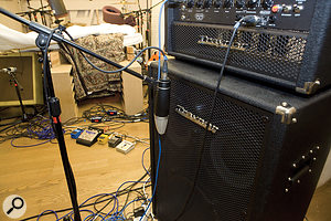 Although the bass-cab mic position gave a desirable mid-range tone, the room’s resonance modes caused problems with the low consistency, so we recorded a DI signal to work around this. Although the bass-cab mic position gave a desirable mid-range tone, the room’s resonance modes caused problems with the low consistency, so we recorded a DI signal to work around this.