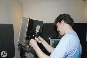 An SE Reflexion Filter was fitted to the mic stand, to reduce the amount of room reflection reaching the microphone. An SE Reflexion Filter was fitted to the mic stand, to reduce the amount of room reflection reaching the microphone.