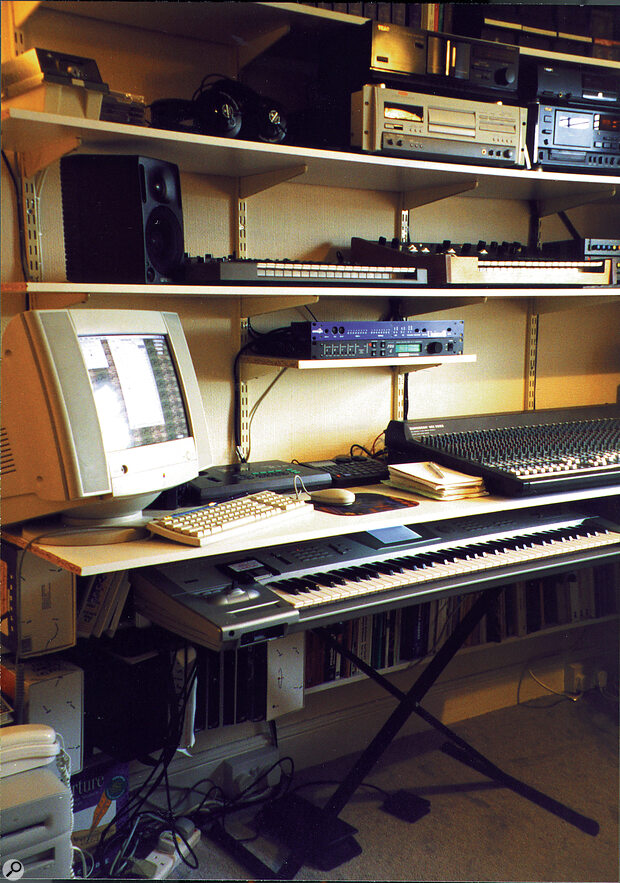 The finished system. We made the wiring look as tidy as possible by sticky‑taping it to the sides of battens or underneath shelves. Our Korg Trinity, which we use as a master keyboard and can be seen at the bottom of the picture, just pushes under the main work surface when not in use.