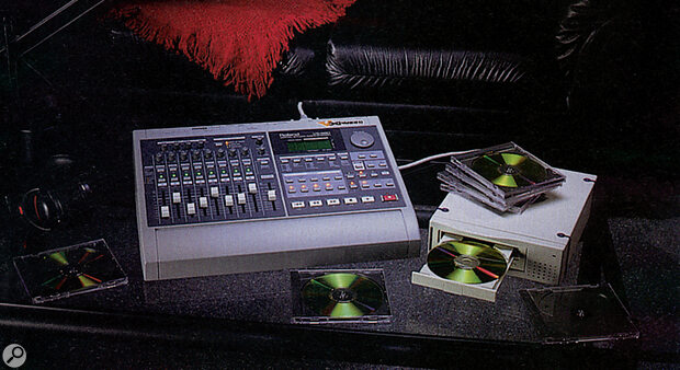 Roland VS880 with the original Roland‑badged stand‑alone CD recorder.