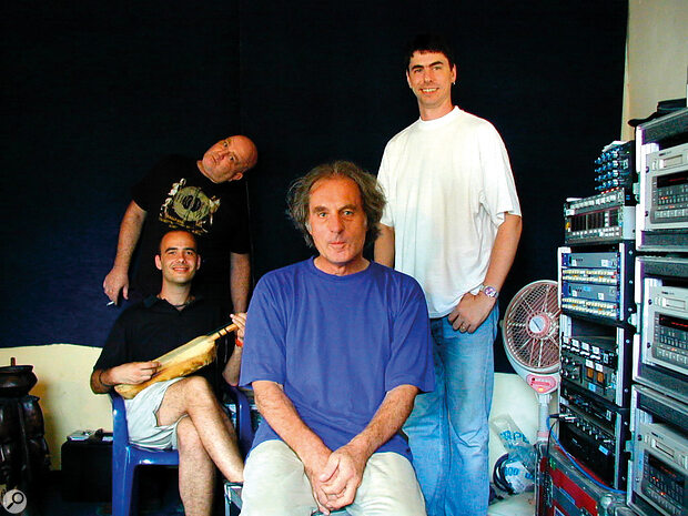 John Leckie (front) in Senegal with Palm Pictures A&R man Jumbo Vanrenen (leaning), Real World engineer Ben Findlay (right) and cameraman Michel Mowlam, who is holding the hoddu instrument.