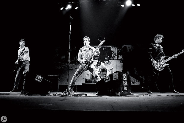 The Clash on stage at the Rainbow Theatre, 1977. From left to right: Mick Jones, Joe Strummer and Paul Simonon.