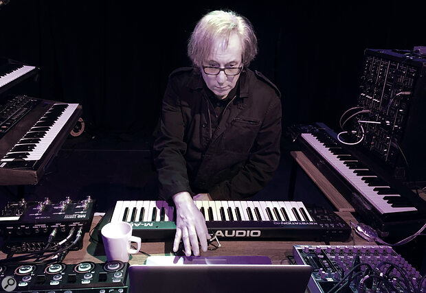 Richard Barbieri, still the proud owner of a Roland System 700 (right) today.