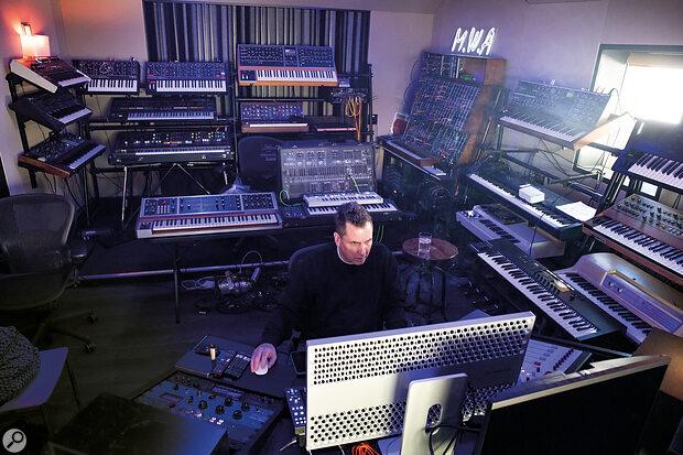 A synth god in his synth Valhalla. Mike Dean’s collection of modern and vintage synths is so huge that they won’t all fit in his studio at once, but among the classics visible in this shot are multiple Moog instruments including a Memorymoog, Minimoog and Voyager, a Yamaha CS80, ARP 2600 and Roland Jupiter 8.