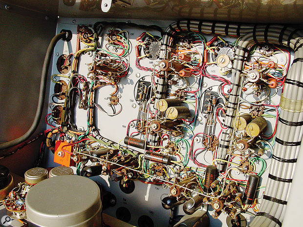 A peek inside reveals the point-to-point wiring.