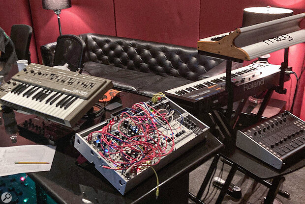 Numerous hardware synths were used on the Larrabee Studios sessions, including a Roland SH‑101 (left) and a portable Eurorack modular system.