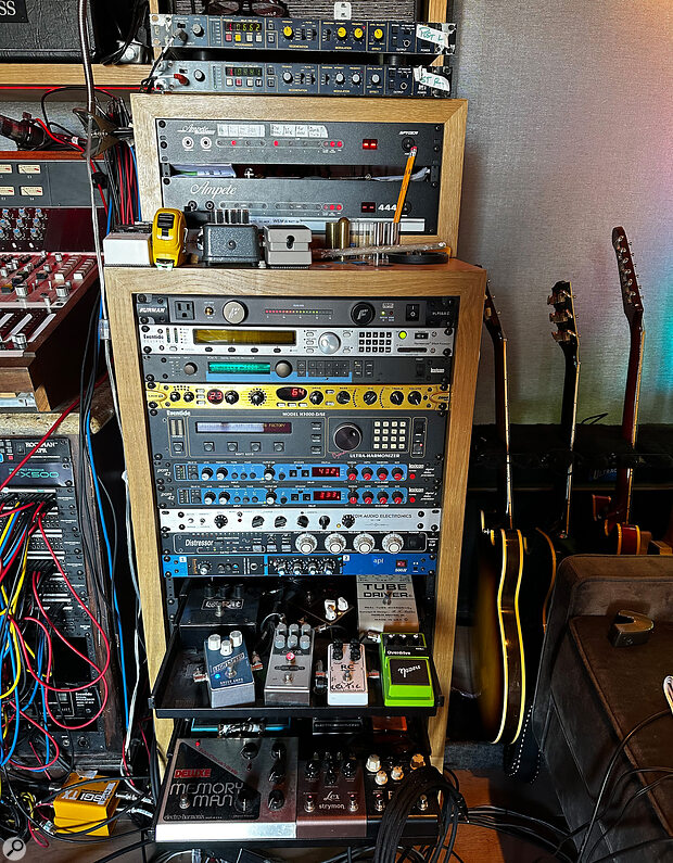 Ampete switchers handle the head/cab routing, with dedicated guitar effects including an API channel strip, a pair of Lexicon PCM 42 delays, a PCM 70 reverb, Eventide Eclipse and H3000 Harmonizers, and an Empirical Labs Distressor compressor.