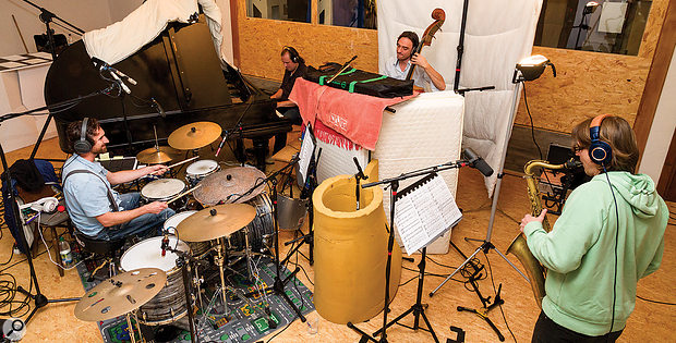 Although the band normally played together in the main recording room (below), all the vocals were recorded in an adjacent DIY vocal booth (above). As a  result, no ambient sound from the singer spilled onto any of the other mics in the setup, so the voice, therefore, didn’t blend naturally with the rest of the band in the mix.