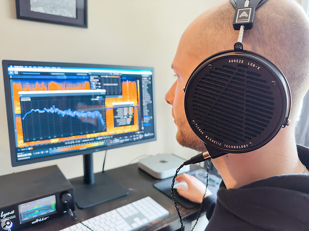 The author checking a master on his Audeze headphones. Sometimes a change of perspective reveals that a drastic EQ move wasn’t necessary after all!