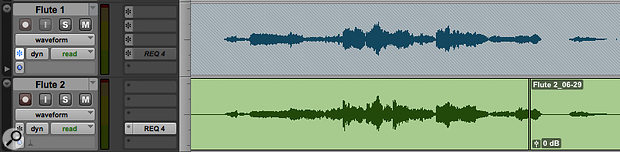 The upper track in this screenshot is frozen: note the greyed-out insert slots and the ‘hatched’ waveform background.