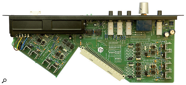 An individual channel module, revealing the discrete transistor circuitry.