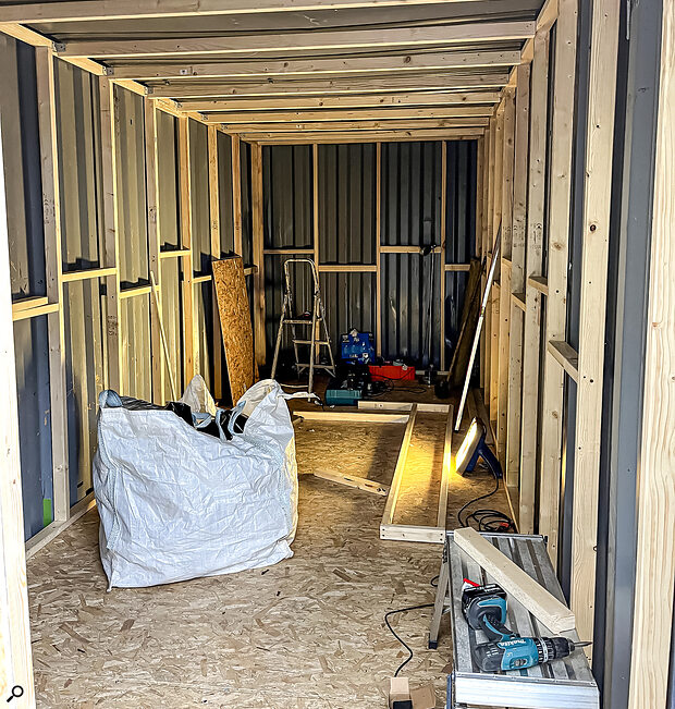 OSB on the floor, and wall studwork completed, ready to be filled with insulation.