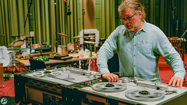 Radiophonic Workshop archivist Mark Ayres plays a tape loop at Maida Vale Studios in July 2023.