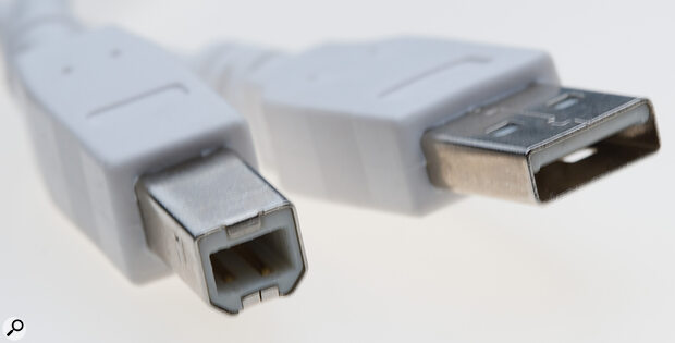 (Left) A USB Type-B connector with the classic Type-A (right).