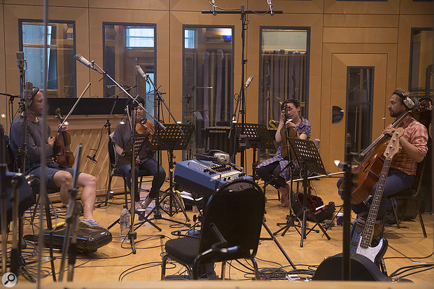 Arranger Sally Herbert (second from left) playing in London's AIR studios at a string-quartet session.