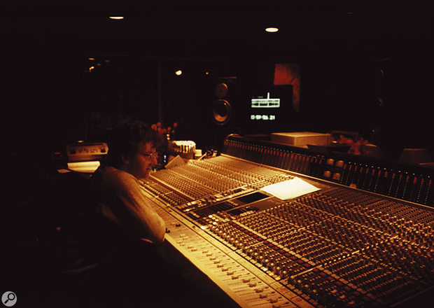 The SSL desk at Mayfair Studios was the first 6000 made, and the sessions for 'What's Love' exploited its features to the full. This photo shows John Hudson working on the mix. 