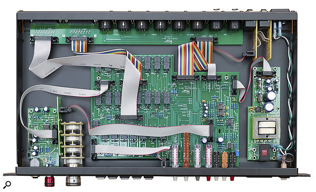 A peep inside: you can see the ganged balanced switched attenuator, relay switching for inserts and monitoring, and the switchable-voltage mains PSU.