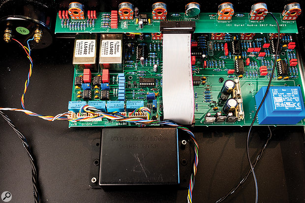 The entire circuitry, most of which is reserved for the side-chains, fits on a  fairly small PCB. Note the container for the opto coupler in the foreground and the pair of Lundahl LL5402 audio transformers on the left-hand side.