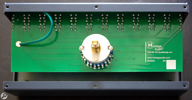 A peep inside reveals neat but simple construction, with the large rotary switch attached to a single circuit board, to which the jack sockets are also soldered.