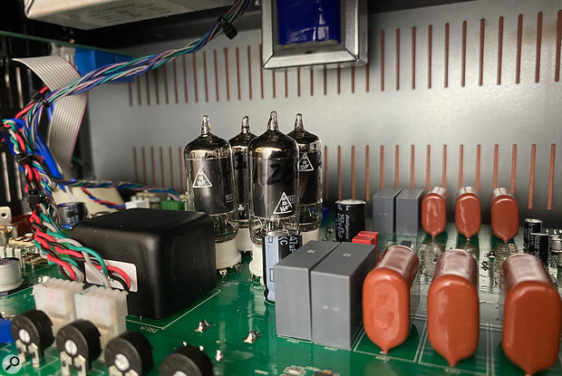 Inside, almost all the components, including the four valves, sit on a single circuit board, though the output transformers are attached to the chassis independently.