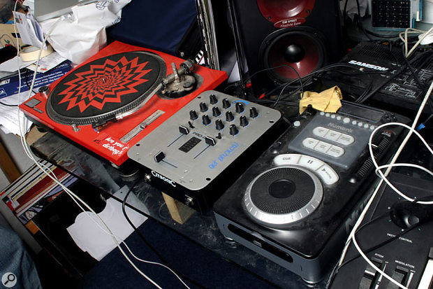 DJ gear includes a record deck and a CD 'turntable'. 