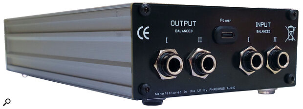 The rear panel, showing the TRS balanced/unbalanced audio socketry and USB‑C power input.