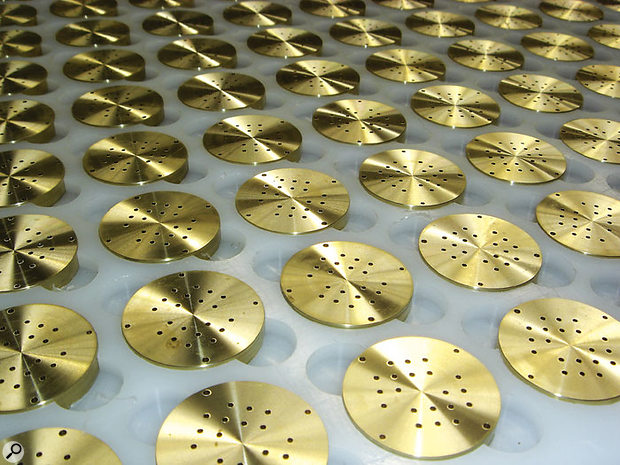 Diaphragm backplates following drilling.