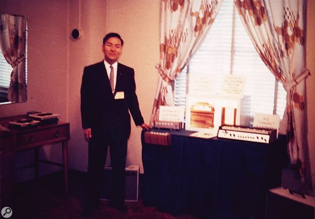 Ikutaro Kakehashi, founder of Roland, at the 1964 NAMM show with the Ace Electronics R1 and Canary.