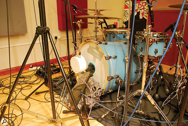 Keen to keep the contribution of the kick drum’s resonant head, Neil used a Sennheiser MD421 to mic inside the small hole on that head, along with a sub-kick-style mic to fill out the low end that the first one seemed to lack.