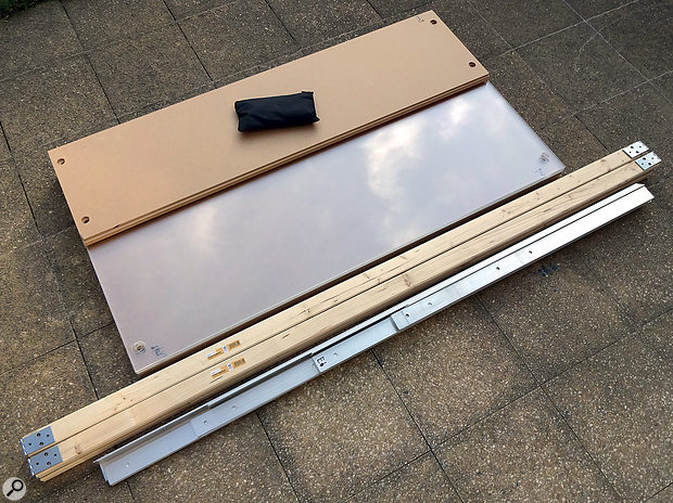 All the structural components of the baffle flatpacked, ready for transporting to the recording venue: the MDF and Perspex panels formed a  stack measuring about the same size as a  typical mineral-wool bass trap, while the bundle of cross-braces and profiling were around 170cm long.