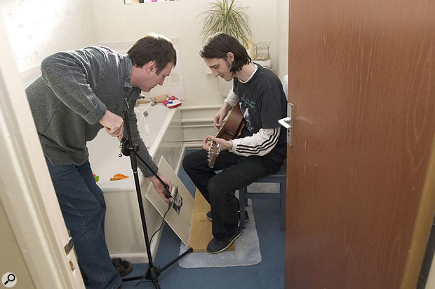 Having worked out how to mike the guitar for a good sound in the lounge, Paul and Rod adjourned to the bathroom, where Rod likes to make use of the natural ambience, to settle on the best seating and miking positions there. 