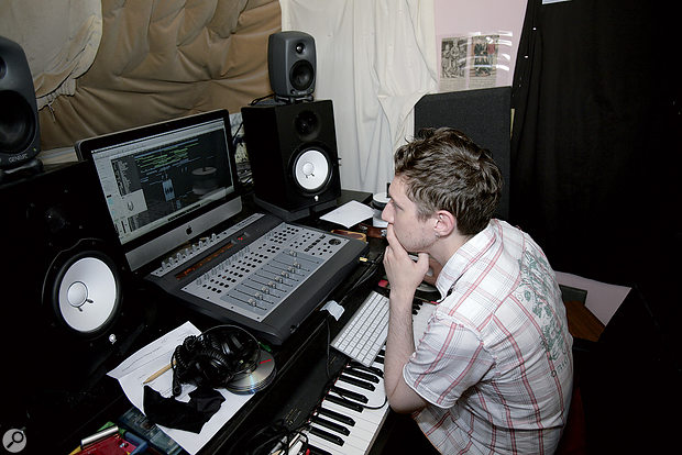 After: Matthew in his newly reconfigured studio. The Genelecs were placed on top of the Yamaha monitors, but angled down towards the listening position, while the Yamahas themselves were moved forward, which minimised the amount of sound being reflected off the desk.