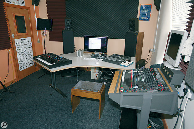 The obligatory 'after' shot. You can see that not only did we put up more Auralex foam to tame unwanted reflections and tighten the stereo imaging, but turned the whole studio around so the speakers fired down the longer axis of the room. We also removed as much clutter as we could, to create a much more pleasant and practical environment. 