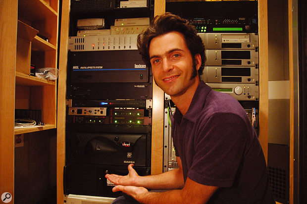 Dweezil Zappa shows off the Verari dual-Opteron PC in the UMRK machine room.