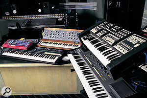 Marius's much‑used Nord Lead sits atop a Yamaha DX7 mk II, and next to a selection of analogue synths — Minimoog, OSCar and Roland HS60.