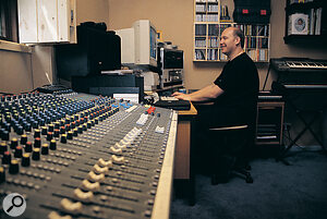 Cousins at the keyboard in his studio, with the Spirit desk in the foreground.