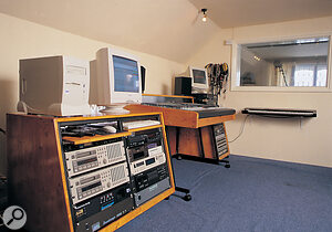 The control room, showing the main equipment racks and the Soundcraft Ghost desk.