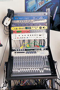 The studio's collection of rackmount gear, from top: MOTU 2408 audio interface, Emagic AMT8 MIDI interface, Zoom 1201 multi‑effects, SPL Vitalizer enhancer, Emu Orbit sound module, Boss VF1 multi‑effects (left) and Samson headphone amplifier, TLA VP5051 voice channel, Emu Proteus 2000 sound module, Akai S3000XL sampler, and Mackie 1604 VLZ Pro mixer.