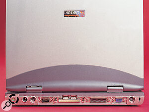 The back panel sports a PS/2 mouse/keyboard port, a serial port, two USB ports, a parallel printer port, outlets for a VGA monitor and S‑Video TV display, and a Replicator port allowing you to duplicate the functions of these ports on an external Port Replicator.