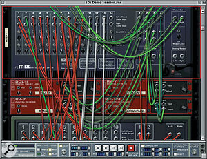 Swing the rack around for a back panel view. The white cables that don't fit the normal colour‑coding scheme route audio from the Rebirth input machine.