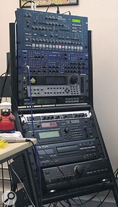 The main rack in the Smartdog studio contains, from top: Korg MS2000R and Novation Supernova II virtual analogue synths, Emu EIII sampler, Alesis Midiverb 4 multi‑effects, Behringer Composer compressor, Roland Orchestral expander and JV2080 sound module, and a Tascam DA20 DAT recorder.