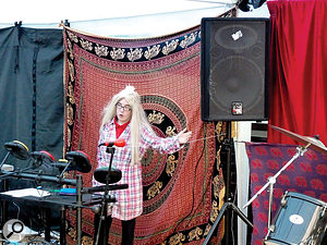 Mary Jarvis performs using a Soundbeam system. Again, a simple low-tech addition — a piece of string following the line of the invisible beam — helped make the instrument easier to use.