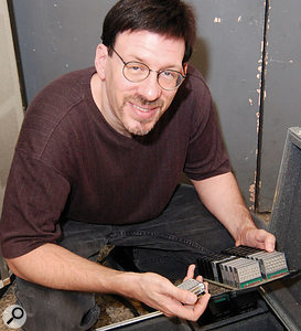 GX1 voices were programmed onto matchbox-sized cartridges. Each cartridge had 26 screw-sized dials on it to change the VCO, VCF, VCA and envelope of the voice. Seventy cartridges in total were loaded into racks that emerged from the top of the console. Rob Arbittier demonstrates how the GX1 modules are inserted.