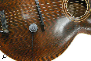 Schertler's DYN–G pickup is one of a range of surface–mounted dynamic pickups that plug straight into your desk's mic input, or into an acoustic instrument amplifier.