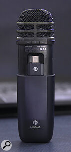 On the opposite side is a cavity for housing the RX Mini low‑latency wireless dongle.