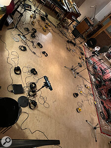 A Neumann KU100 binaural ‘dummy head’ [shown to the right on a mic stand] was used at Atlantis to track sources such as choir and glockenspiel.