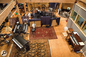 Taylor’s backing band was tracked live at the Barn, with the singer/guitarist in a  booth. This photo shows the layout of the large space where the musicians played together.