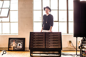 Jon Castelli with the rack of Hazelrigg Industries VLC-1 tube channel strips that are central to his studio, The Gift Shop.